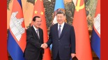 習近平會見柬埔寨人民黨主席、參議院主席洪森_fororder_1782454136503_224