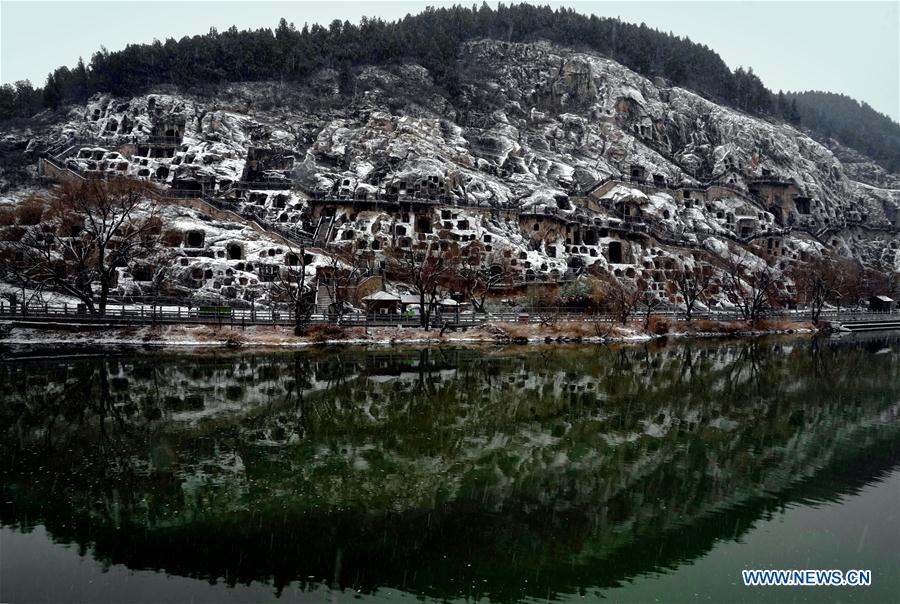 In pics: snow-covered Longmen Grottoes in Luoyang, C China's Henan