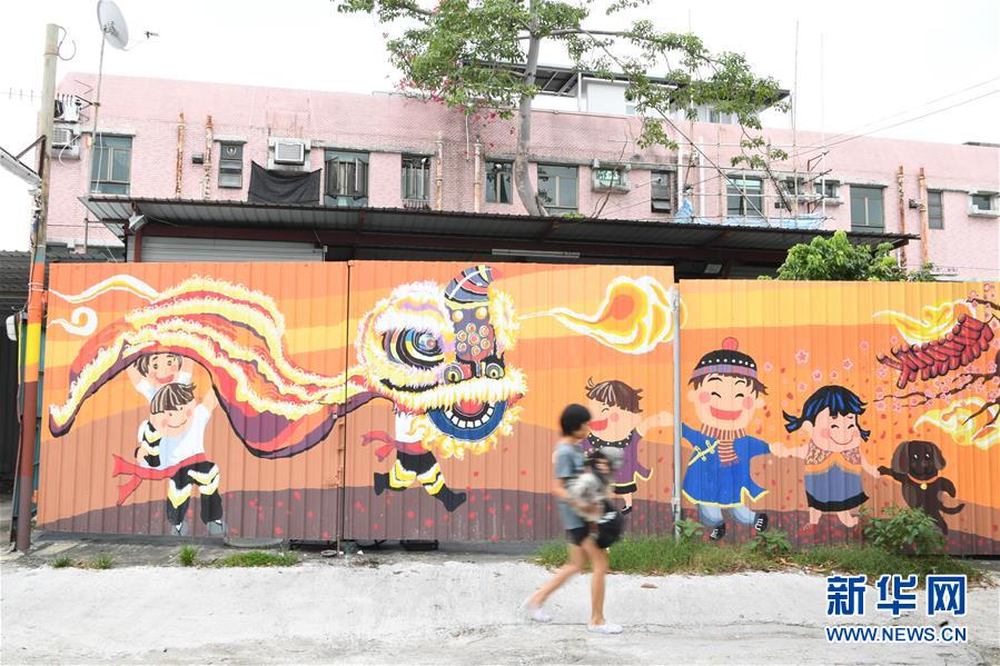 香港锦田壁画村：200名义工绘就爱的画卷