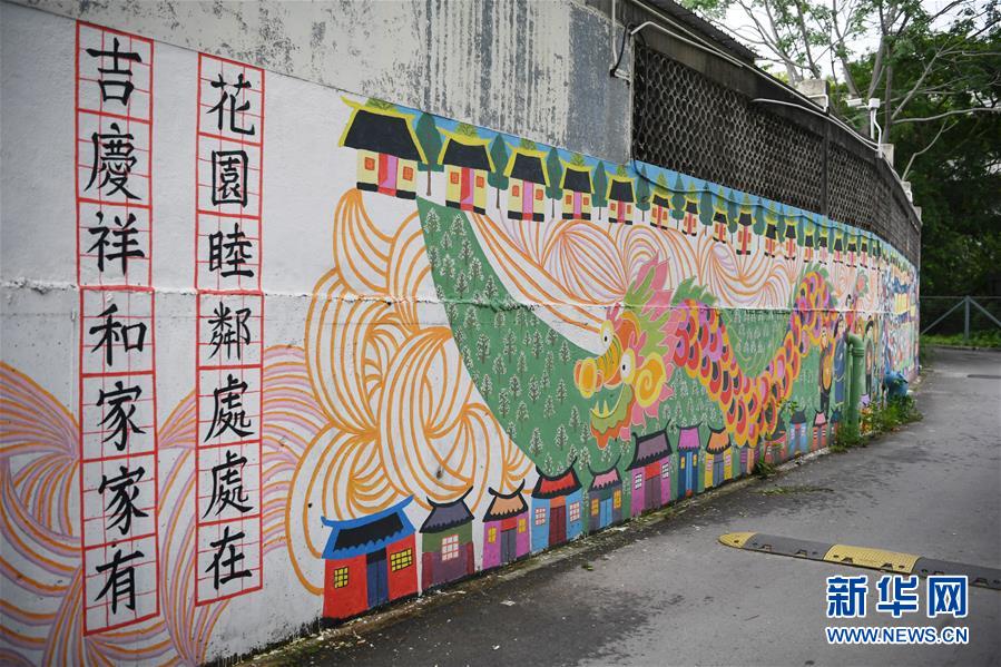 香港锦田壁画村：200名义工绘就爱的画卷