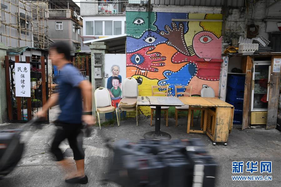 香港锦田壁画村：200名义工绘就爱的画卷