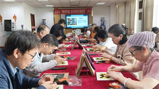 沈阳市皇姑区举办“跨界共融 全民阅读非遗实践”活动_fororder_马静皇姑阅读2