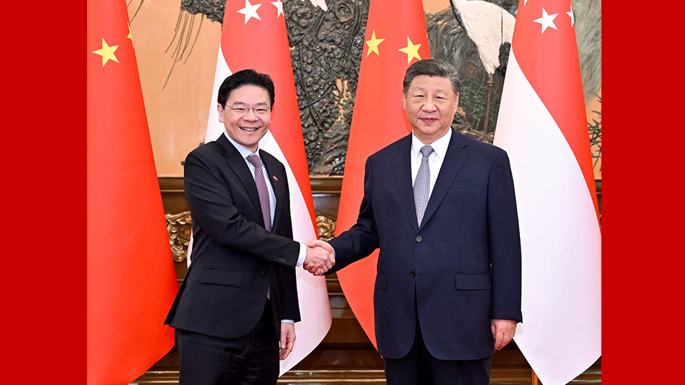 【讲习所·中国与世界】习近平：以更高水平政治互信服务中新关系发展_fororder_推荐大图