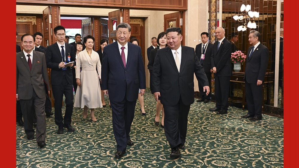 习近平夫妇出席金正恩夫妇举行的小范围午宴_fororder_2