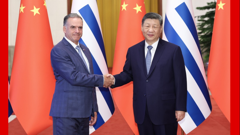 习近平同乌拉圭总统奥尔西举行会谈_fororder_1770096510081_800