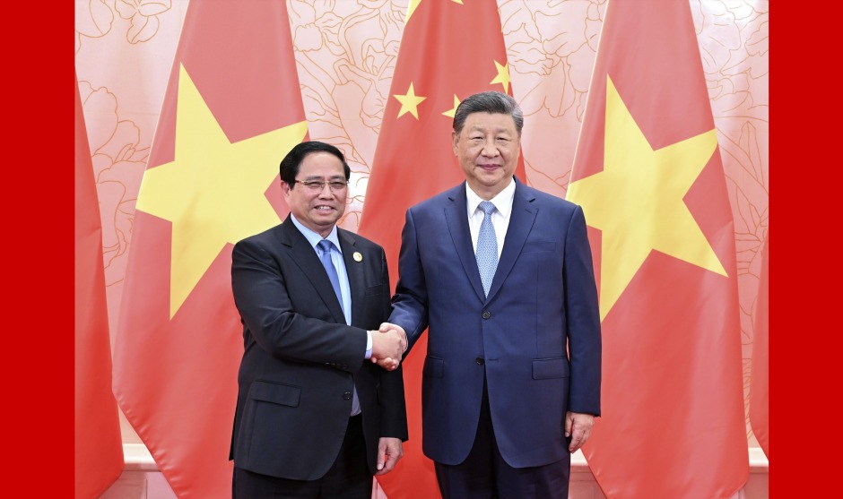 习近平会见越南总理范明政_fororder_1