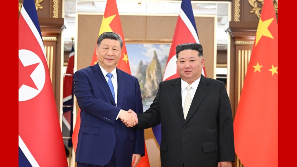 习近平同金正恩举行会谈