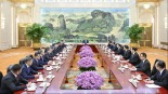 习近平集体会见上海合作组织成员国外长理事会会议外方代表团团长