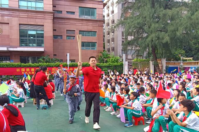十五运会和残特奥会火炬点燃红色少年梦_fororder_图片2