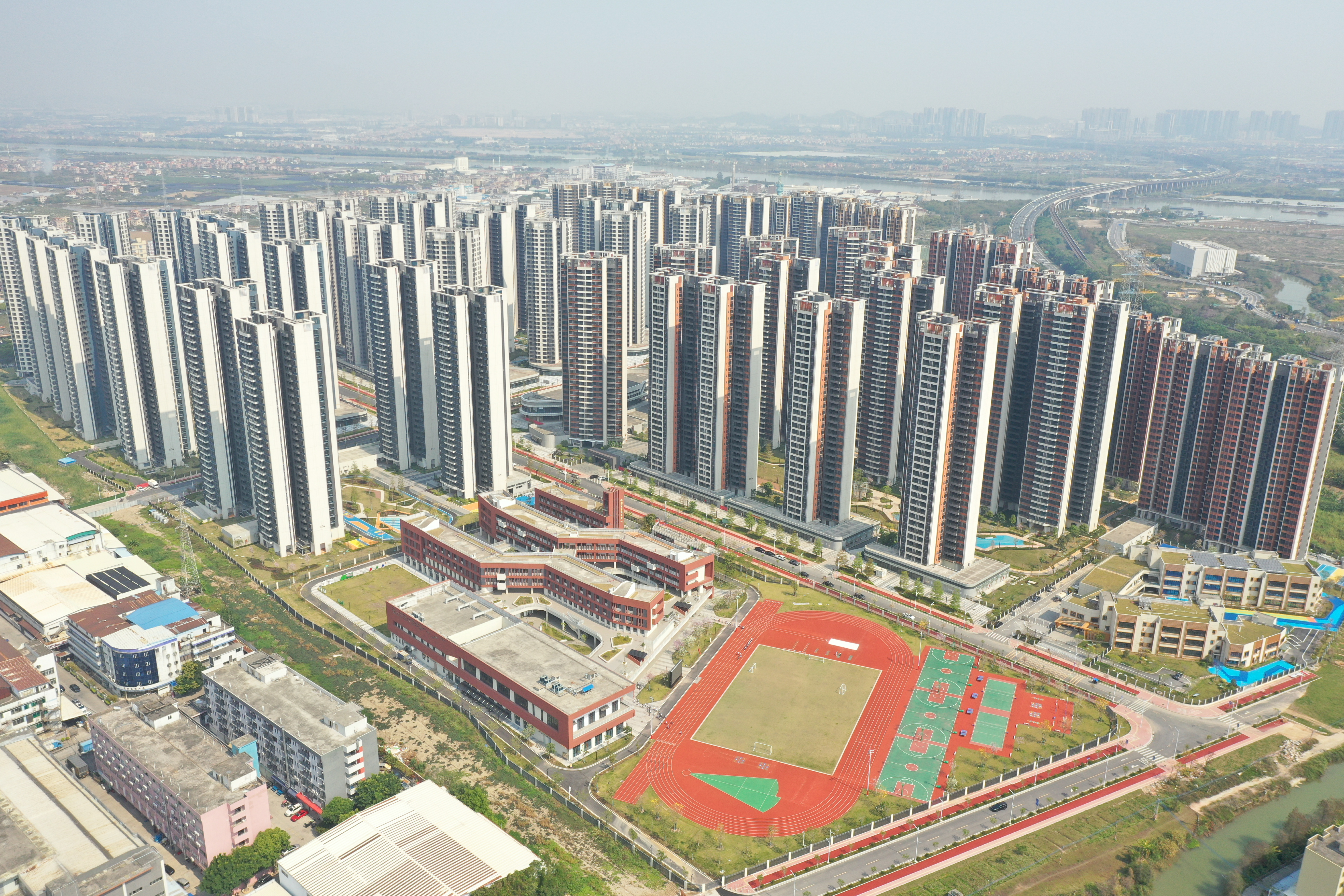 广东建筑行业“高质量发展”系列|锻造新质生产力 实现建筑业跨越式升级 ——探析中铁二十五局总经理程志强的破局实践​_fororder_粤港澳大湾区重点民生工程——南沙庆盛枢纽安置房