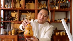 葫芦烙画：非遗巧绘马拉松 保定技艺焕新彩