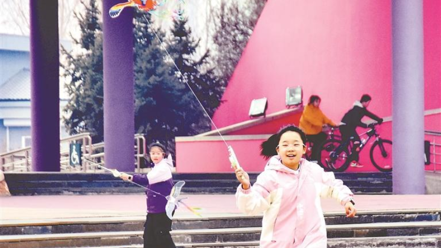 牵一根线放飞春天