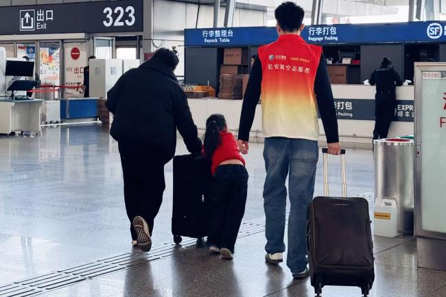 新春走基层 | 新海航长安航空开展“青春志愿行，温暖回家路”志愿服务活动_fororder_图片2