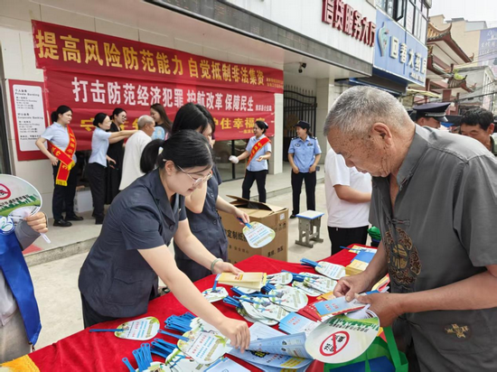 守住钱袋子 河南省淮滨县法院开展防范非法集资普法宣传活动_fororder_图片6