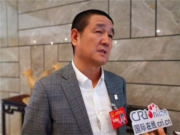 （史佳已审）【代表谈】陕西省人大代表杨忠：做强陕南美食助力陕西发展