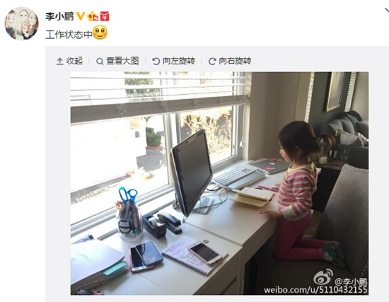 李小鹏晒爱女“工作照” 奥莉蹲坐桌前敲键盘(图)