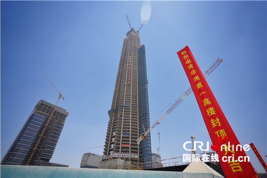 中企承建“非洲第一高楼”正式封顶_fororder_埃及新行政首都中央商务区标志塔项目.JPG
