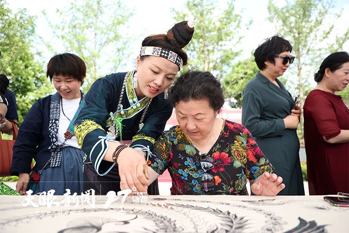 （中首）丰富非遗体验 美丽乡村迎客来