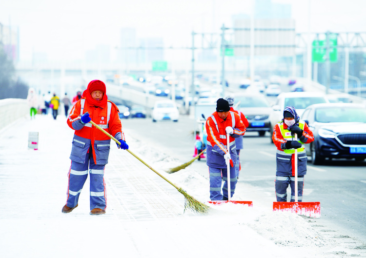 雪落春城景色美 空气清新交通畅
