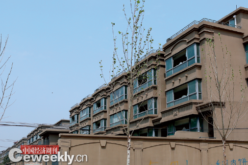 北京一楼盘10年不交房 业主入住“半成品”(图)