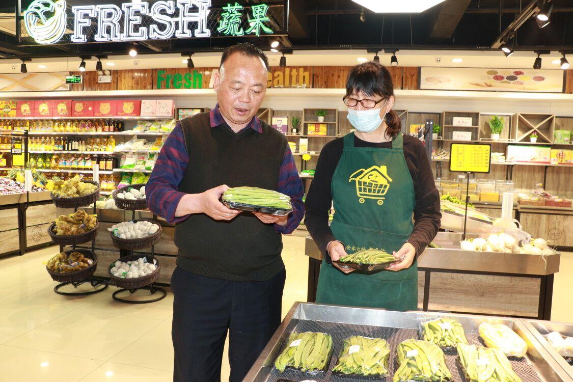 一根扁担起家 挑起30年诚信