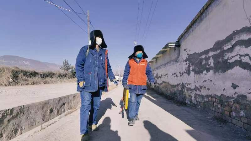【新春走基层】“贴心电”绘就新春“敬业福”_fororder_图片30