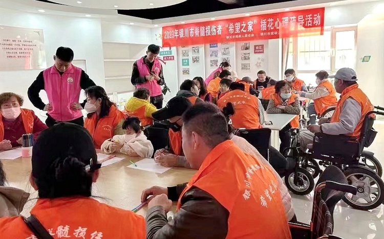 在轮椅上也要“向阳而生” 银川市组织脊髓损伤者插花解压_fororder_截屏2023-03-27 09.43.57