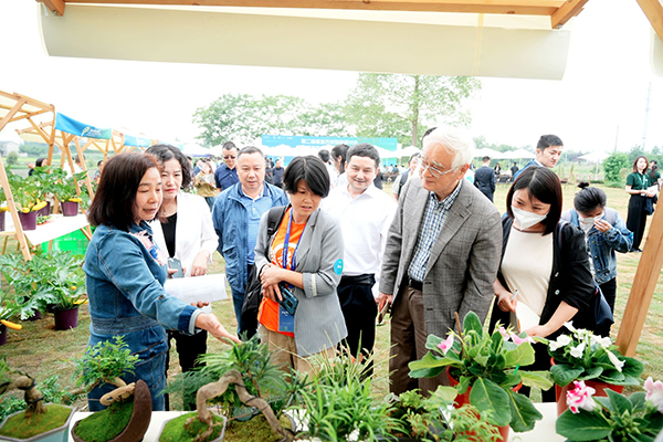现代都市农业国际高峰论坛永久会址落地成都温江区_fororder_参观现场-供图-成都市温江区委宣传部