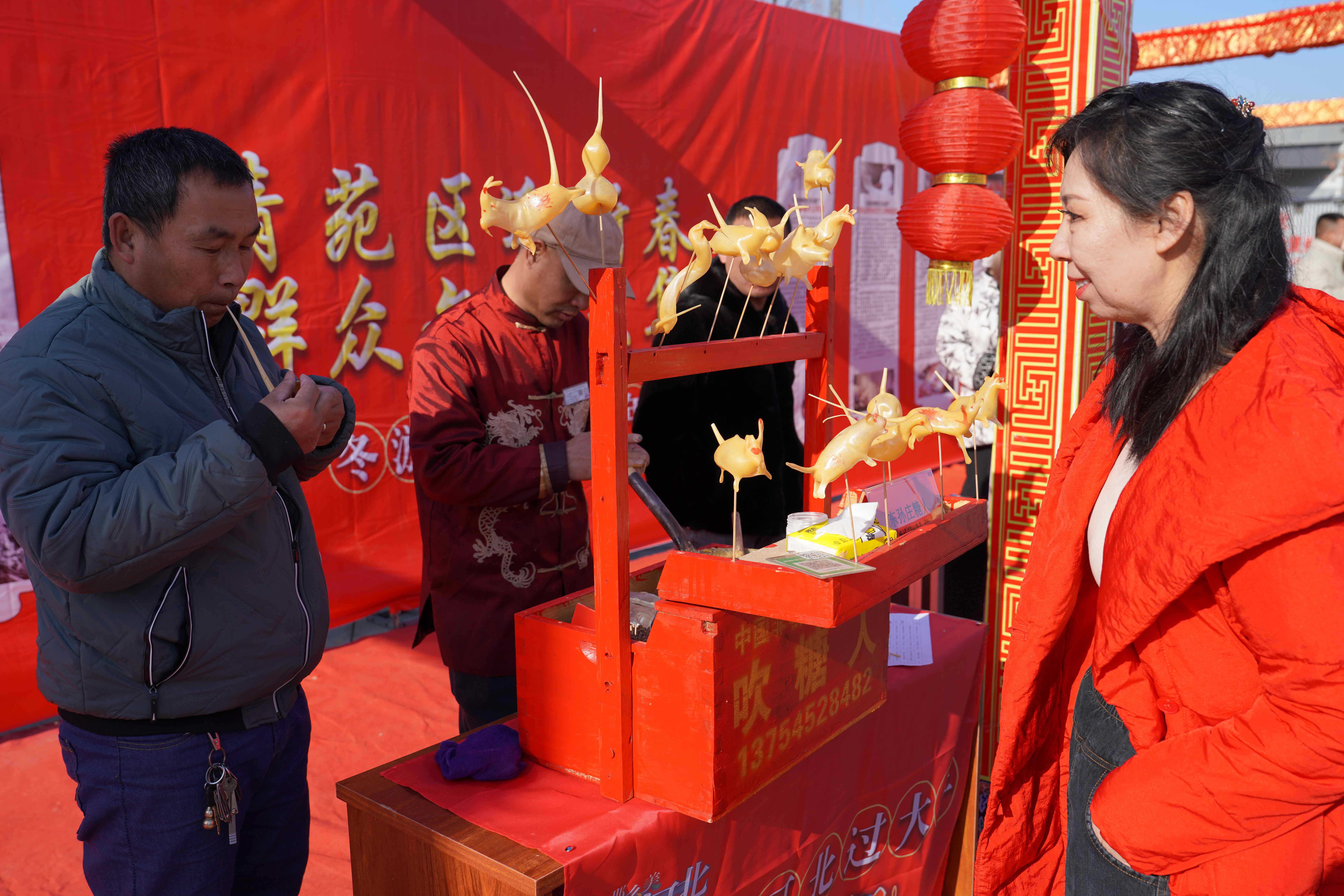 图片默认标题_fororder_非遗项目吹糖人技艺展示。摄影 王磊