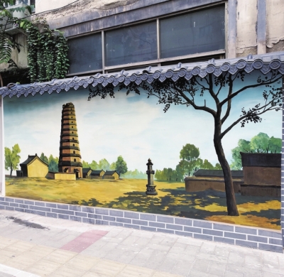 【河南在线-文字列表】【移动端-图片新闻列表】郑州市顺河路：电线杆上玩创意 瞬间扮靓整条街