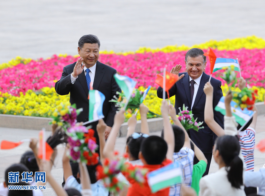 习近平同乌兹别克斯坦总统米尔济约耶夫举行会谈