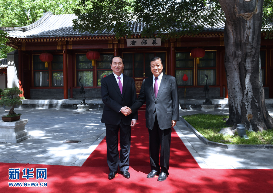 刘云山会见越南国家主席陈大光