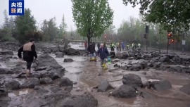 视频丨河水淹没街道 智利首都圣地亚哥遭山洪侵袭