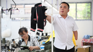 全国助残日丨单手绣“华服” 情暖助残路