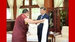 习近平接受班禅额尔德尼·确吉杰布拜见_fororder_1749203895755_974