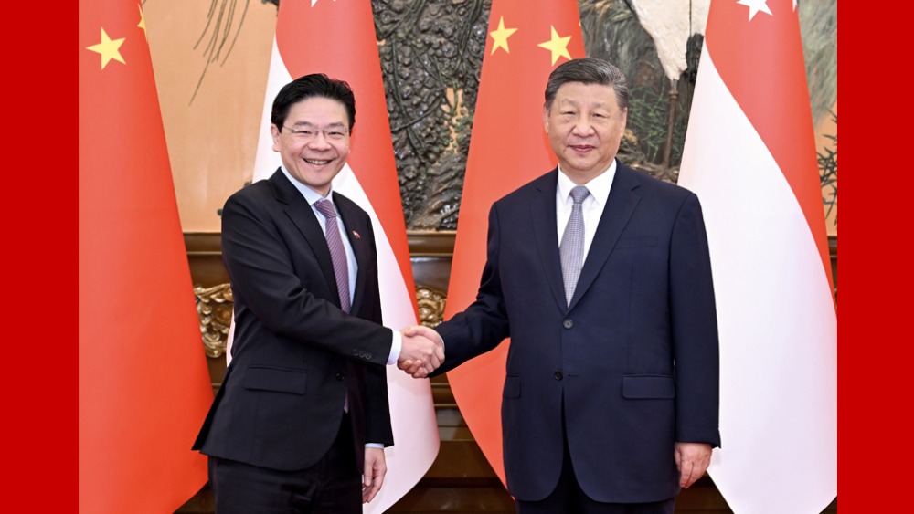 习近平：中方愿同新方加强战略沟通 拉紧合作纽带 携手应对挑战_fororder_1750742619729_592