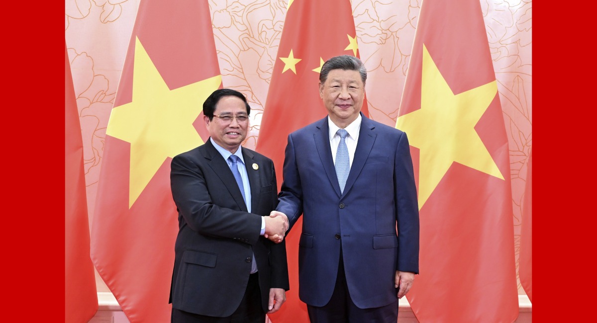 习近平会见越南总理范明政_fororder_1