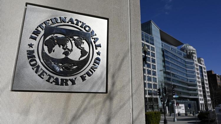 IMF上调全球增长预期 呼吁减少贸易壁垒