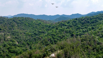 Dawu, Hubei: Heavy-Lift Drones Carry Tower Components Across Deep Mountains
