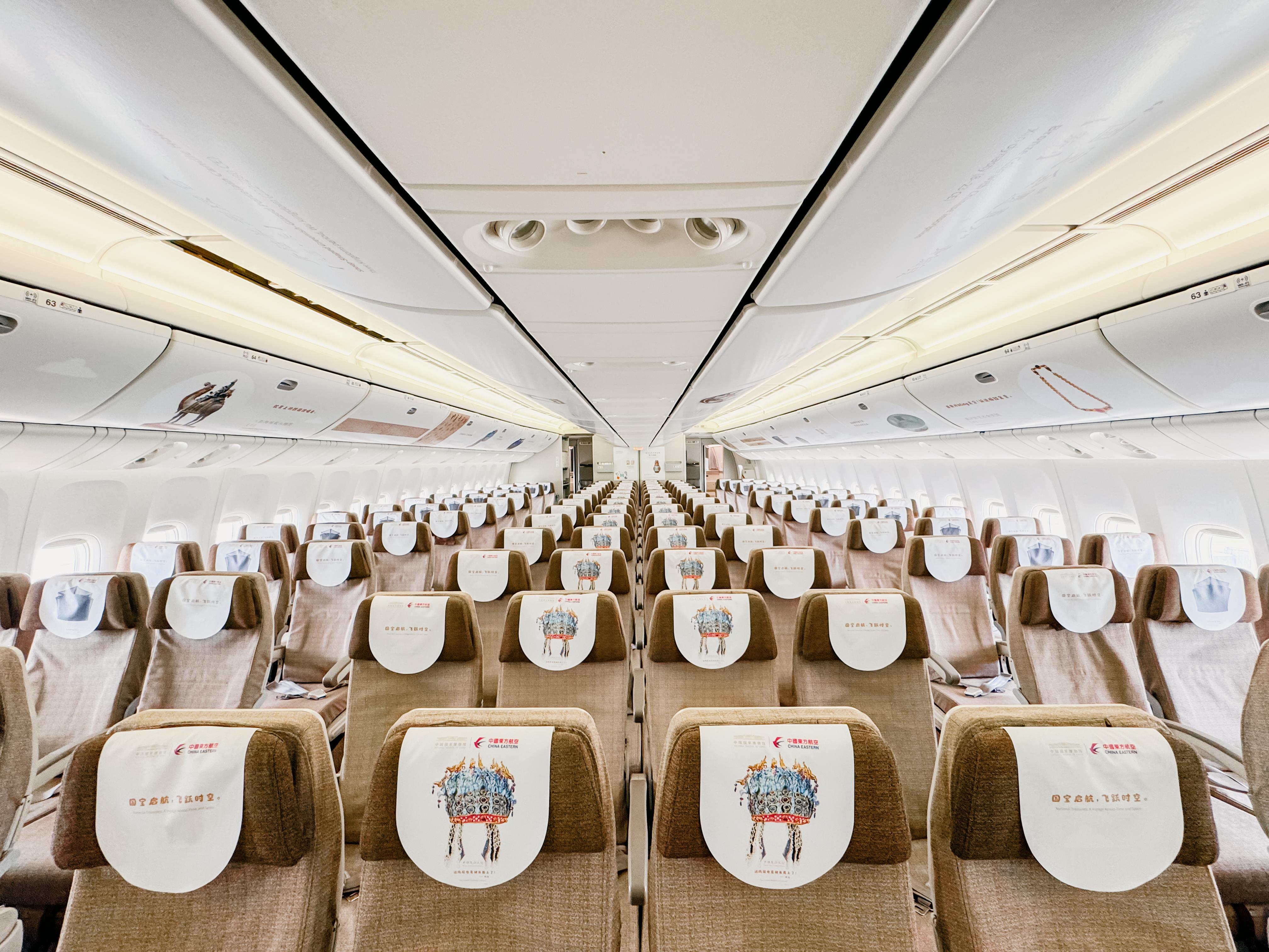 “国博号”主题彩绘飞机首航 架起文明传播“空中桥梁”_fororder_2