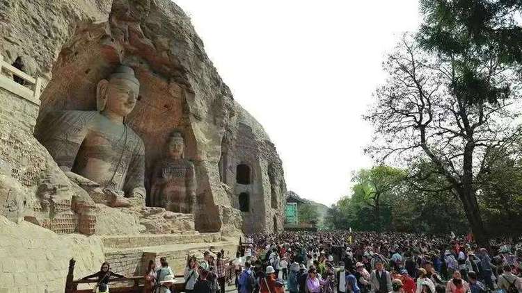 资讯有故事｜千年云冈石窟如何持续焕发生机？全国人大代表杭侃这样说